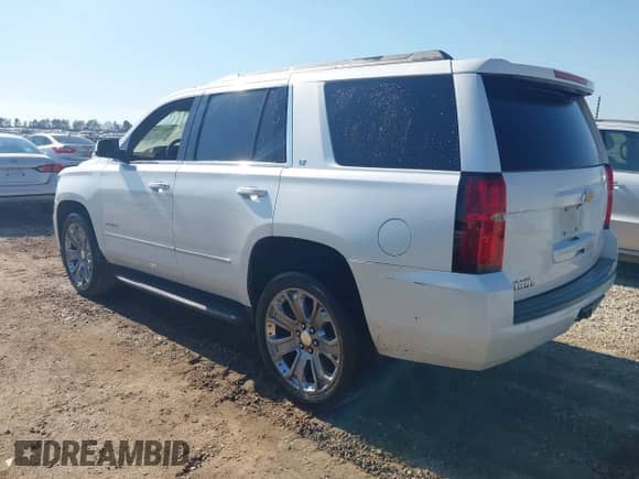 2020 Chevrolet Tahoe LT with VIN 1GNSCBKC9LR196546, listed as a IAAI auction lot 41661308 with 132,714 mi miles and . Bid and sale history available at DreamBid. Image 3.