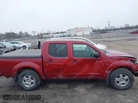 2007 Nissan Frontier LE with VIN 1N6AD07W27C456641, listed as a IAAI auction lot 41530418 with 94,792 mi miles and . Bid and sale history available at DreamBid. Image 13.