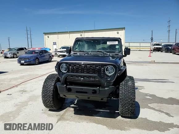 2024 Jeep Wrangler Willys with VIN 1C4RJXDG9RW286042, listed as a Copart auction lot 49459025 with 6,417 mi miles and Salvage title. Bid and sale history available at DreamBid. Image 14.