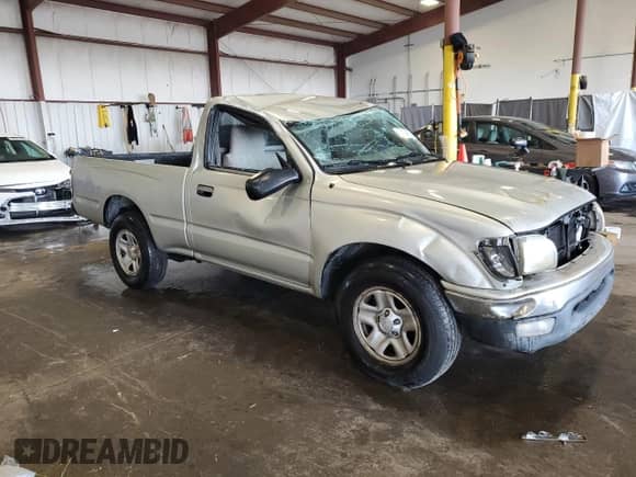 2002 Toyota Tacoma with VIN 5TENL42N72Z087380, listed as a Copart auction lot 84454855 with 291,069 mi miles and Salvage title. Bid and sale history available at DreamBid. Image 4.