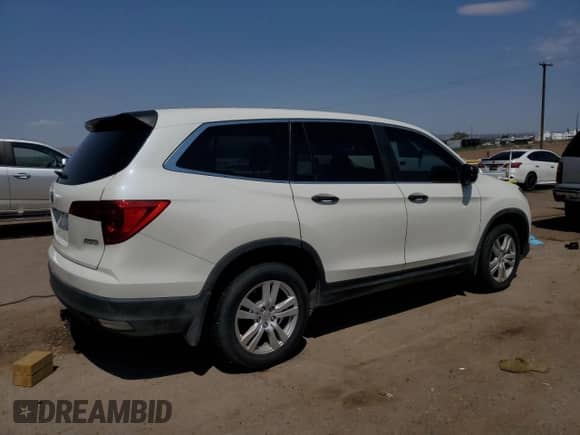 2018 Honda Pilot LX с VIN 5FNYF6H15JB046640, выставлен на аукционе Copart как лот 67303645 с пробегом 50 704 миль миль и Списание • Salvage title. История ставок и продаж доступна на DreamBid. Изображение 3.