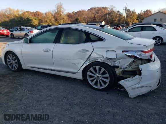 2013 Hyundai Azera с VIN KMHFH4JG8DA260471, выставлен на аукционе Copart как лот 79233704 с пробегом 120 515 миль миль и Списание • Salvage title. История ставок и продаж доступна на DreamBid. Изображение 2.