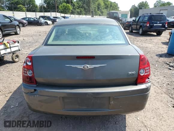 2009 Chrysler 300 LX with VIN 2C3KA43D29H539373, listed as a Copart auction lot 64483475 with 110,153 mi miles and Salvage title. Bid and sale history available at DreamBid. Image 6.