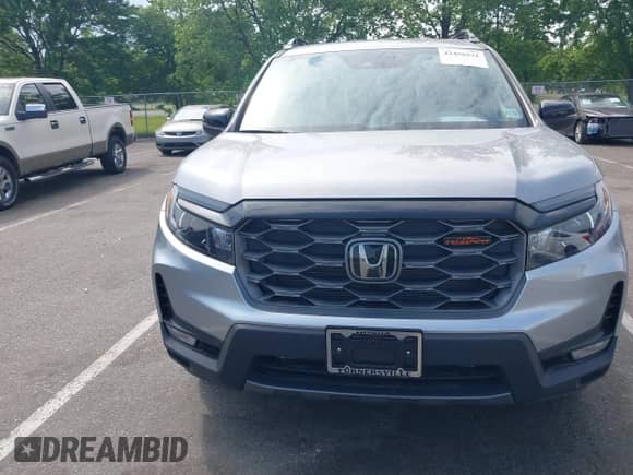 2023 Honda Passport TrailSport с VIN 5FNYF8H68PB043019, выставлен на аукционе IAAI как лот 42456931 с пробегом 7 311 миль миль и . История ставок и продаж доступна на DreamBid. Изображение 12.