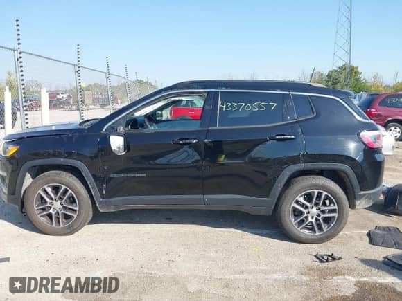 2017 Jeep Compass Latitude z VIN 3C4NJDBB6HT660714, wystawiony jako IAAI lot #43370557 z przebiegiem 99 034 mil mil oraz . Historia ofert i sprzedaży dostępna na DreamBid. Obrazek 14.
