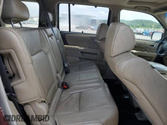 2010 Honda Pilot Touring с VIN 5FNYF4H97AB008479, выставлен на аукционе Copart как лот 63516435 с пробегом 204 150 миль миль и Чистый • Clean title. История ставок и продаж доступна на DreamBid. Изображение 11.