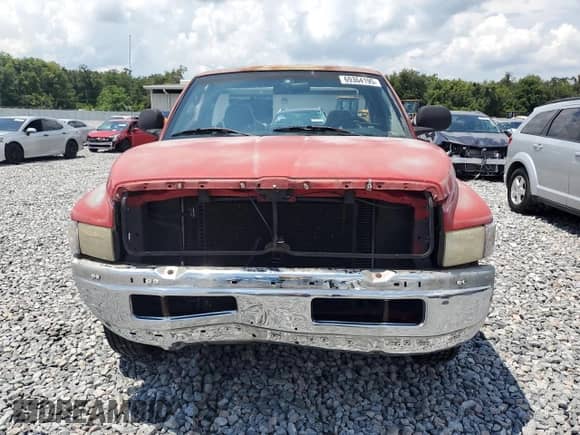 1998 Dodge 1500 с VIN 1B7HC16X7WS675944, выставлен на аукционе Copart как лот 69364195 с пробегом 243 008 миль миль и На запчасти • Non repairable. История ставок и продаж доступна на DreamBid. Изображение 5.