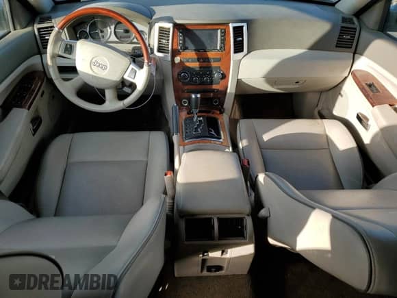 2008 Jeep Grand Cherokee Overland with VIN 1J8HS68288C220981, listed as a Copart auction lot 82556264 with 207,896 mi miles and Salvage title. Bid and sale history available at DreamBid. Image 8.