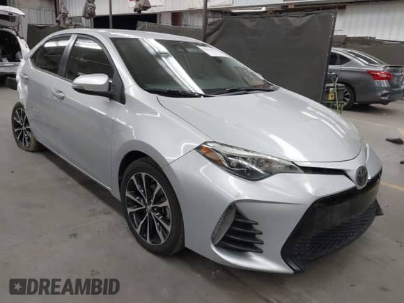 2019 Toyota Corolla L with VIN 2T1BURHE2KC194542, listed as a IAAI auction lot 42853754 with 99,110 mi miles and . Bid and sale history available at DreamBid. Image 1.