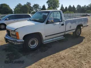 1990 GMC Sierra 1500 with VIN 2GTFC24K3L1516435, listed as a Copart auction lot 63345545 with 91,773 mi miles and Salvage title. Bid and sale history available at DreamBid. Image 1.