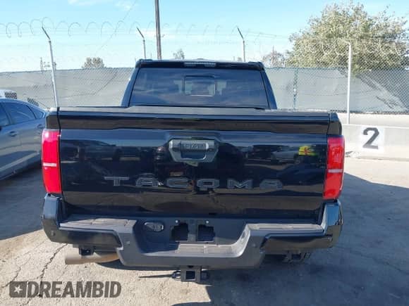 2024 Toyota Tacoma SR5 with VIN 3TMKB5FN3RM000779, listed as a IAAI auction lot 43081279 with 24,906 mi miles and . Bid and sale history available at DreamBid. Image 16.