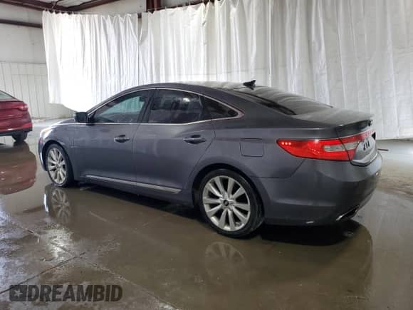 2013 Hyundai Azera z VIN KMHFH4JG2DA321197, wystawiony jako Copart lot #65585084 z przebiegiem 158 956 mil mil oraz Szkoda całkowita • Salvage title. Historia ofert i sprzedaży dostępna na DreamBid. Obrazek 2.