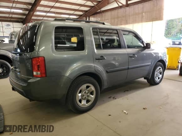 2009 Honda Pilot LX with VIN 5FNYF38219B009703, listed as a Copart auction lot 86054625 with 215,143 mi miles and Clean title. Bid and sale history available at DreamBid. Image 3.