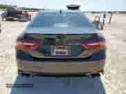 2021 Toyota Camry XSE with VIN 4T1K61AK9MU402834, listed as a Copart auction lot 71657335 with 77,028 mi miles and Salvage title. Bid and sale history available at DreamBid. Image 6.