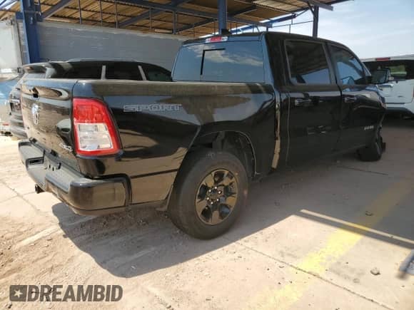 2023 Ram 1500 Lone Star with VIN 1C6SRFFT6PN697147, listed as a Copart auction lot 68788115 with 10,811 mi miles and Salvage title. Bid and sale history available at DreamBid. Image 3.