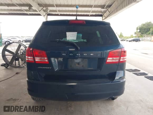 2015 Dodge Journey American Value z VIN 3C4PDCAB8FT597916, wystawiony jako IAAI lot #43164037 z przebiegiem 134 185 mil mil oraz . Historia ofert i sprzedaży dostępna na DreamBid. Obrazek 17.