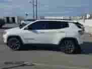 2021 Jeep Compass 80th Anniversary with VIN 3C4NJCEB2MT561291, listed as a IAAI auction lot 43292888 with 102,919 mi miles and . Bid and sale history available at DreamBid. Image 14.