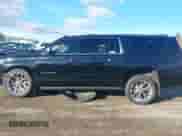 2019 Chevrolet Suburban Premier with VIN 1GNSKJKCXKR111502, listed as a IAAI auction lot 41075435 with 134,555 mi miles and . Bid and sale history available at DreamBid. Image 14.