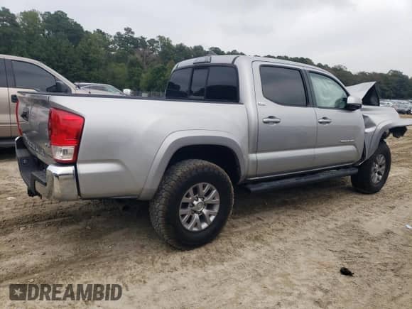 2017 Toyota Tacoma TRD Off Road with VIN 3TMCZ5AN7HM117058, listed as a Copart auction lot 83924325 with Not provided miles and Salvage title. Bid and sale history available at DreamBid. Image 3.
