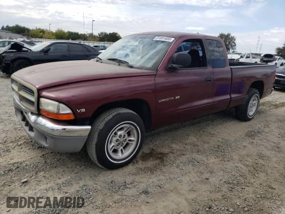 2000 Dodge Dakota Sport with VIN 1B7GL22NXYS529787, listed as a Copart auction lot 81051655 with 292,220 mi miles and Salvage title. Bid and sale history available at DreamBid. Image 1.
