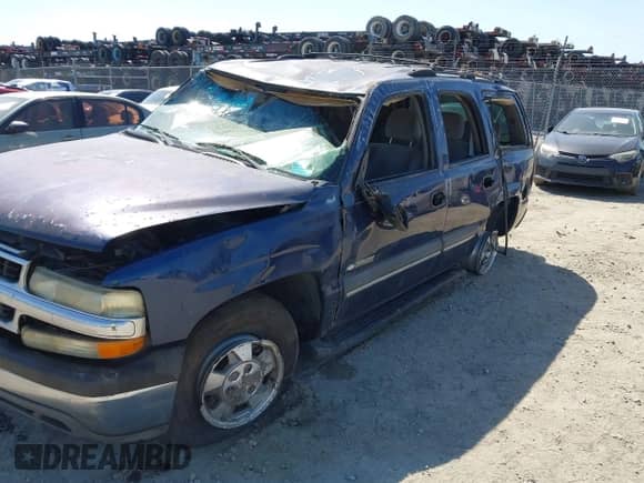 2003 Chevrolet Tahoe LT z VIN 1GNEC13Z13J280286, wystawiony jako IAAI lot #42010980 z przebiegiem Nie podano mil oraz . Historia ofert i sprzedaży dostępna na DreamBid. Obrazek 6.