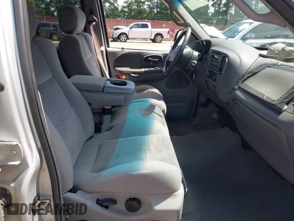 2002 Ford F-150 XLT with VIN 1FTRW07602KB73444, listed as a IAAI auction lot 42744286 with 208,152 mi miles and . Bid and sale history available at DreamBid. Image 5.