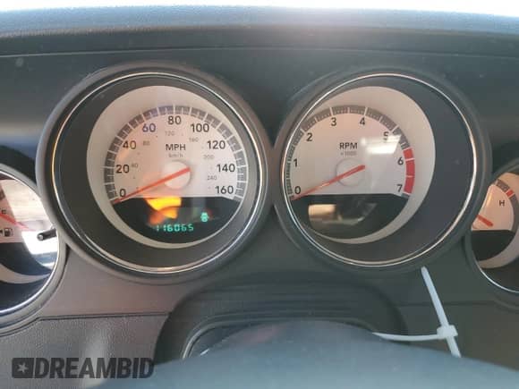 2009 Dodge Challenger R/T with VIN 2B3LJ54T69H510133, listed as a Copart auction lot 87464485 with 116,065 mi miles and Clean title. Bid and sale history available at DreamBid. Image 9.