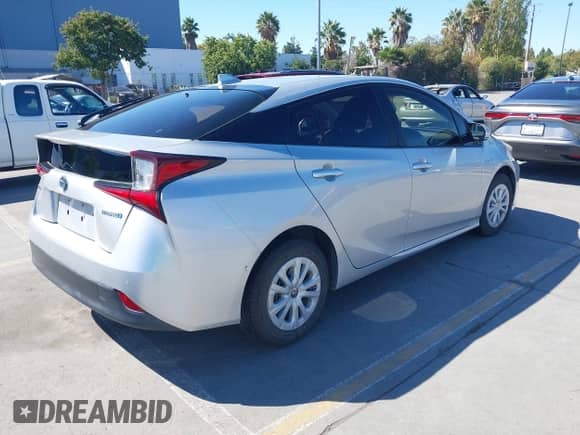 2020 Toyota Prius L Eco with VIN JTDKARFU2L3118901, listed as a IAAI auction lot 43373660 with 147,420 mi miles and . Bid and sale history available at DreamBid. Image 4.