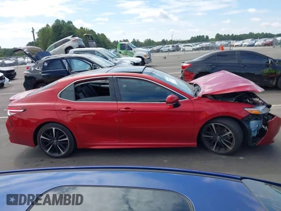 2020 Toyota Camry XSE z VIN 4T1K61AK3LU317132, wystawiony jako IAAI lot #43239395 z przebiegiem 59 174 mil mil oraz . Historia ofert i sprzedaży dostępna na DreamBid. Obrazek 13.