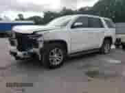 2015 Chevrolet Tahoe LS with VIN 1GNSKAKC6FR284469, listed as a Copart auction lot 57643795 with 213,899 mi miles and Salvage title. Bid and sale history available at DreamBid. Image 1.