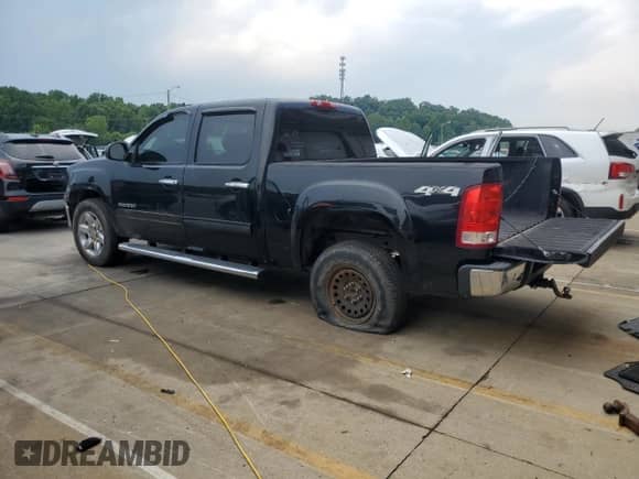 2012 GMC Sierra 1500 SLE with VIN 3GTP2VE73CG116160, listed as a Copart auction lot 66986635 with 230,723 mi miles and Salvage title. Bid and sale history available at DreamBid. Image 2.