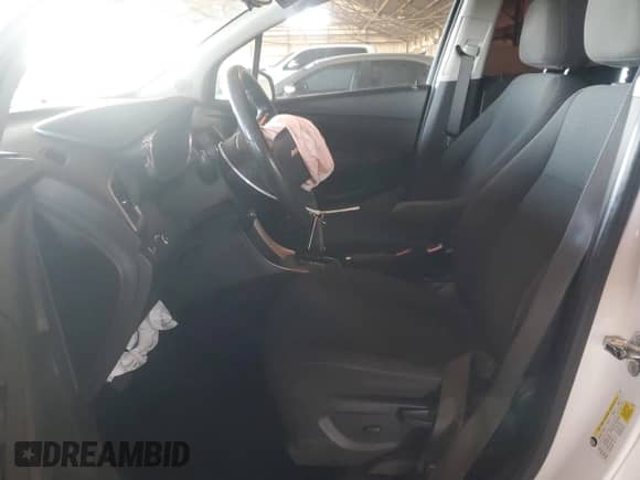 2020 Chevrolet Trax LS с VIN KL7CJKSB8LB324582, выставлен на аукционе Copart как лот 85405115 с пробегом 79 404 миль миль и Списание • Salvage title. История ставок и продаж доступна на DreamBid. Изображение 7.