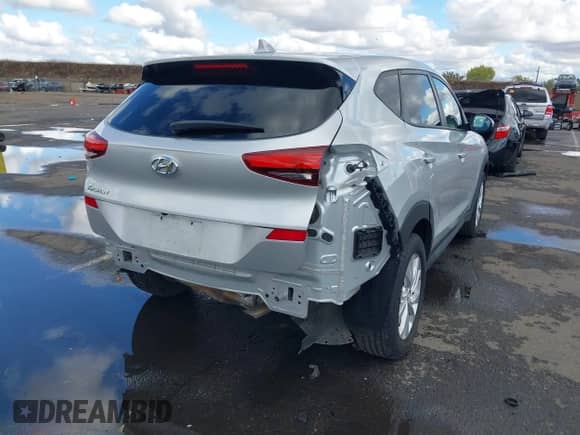2019 Hyundai Tucson SE with VIN KM8J23A44KU974895, listed as a IAAI auction lot 43469969 with 72,513 mi miles and . Bid and sale history available at DreamBid. Image 4.