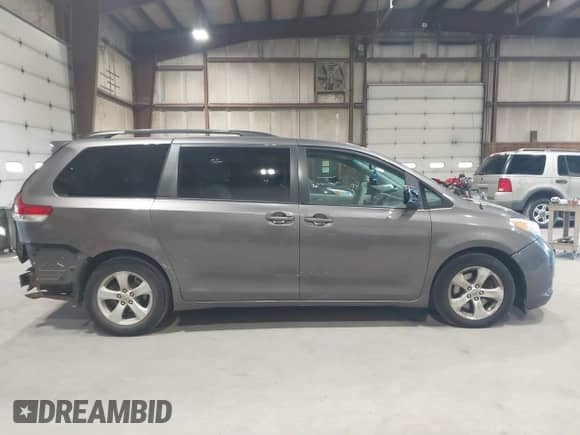 2011 Toyota Sienna LE with VIN 5TDKK3DC5BS076922, listed as a IAAI auction lot 43339975 with 196,118 mi miles and . Bid and sale history available at DreamBid. Image 14.