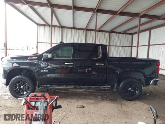2021 Chevrolet Silverado 1500 LTZ with VIN 3GCUYGET2MG143300, listed as a IAAI auction lot 42164480 with 95,236 mi miles and . Bid and sale history available at DreamBid. Image 14.