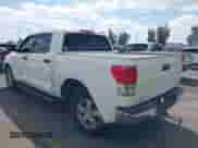 2013 Toyota Tundra with VIN 5TFDY5F16DX301294, listed as a IAAI auction lot 43190182 with 219,627 mi miles and . Bid and sale history available at DreamBid. Image 3.