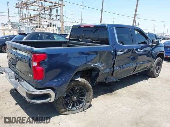 2021 Chevrolet Silverado 1500 LTZ with VIN 3GCUYGEDXMG429291, listed as a IAAI auction lot 42338988 with 33,558 mi miles and . Bid and sale history available at DreamBid. Image 4.
