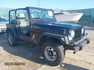 2004 Jeep Wrangler SE z VIN 1J4FA29144P797861, wystawiony jako IAAI lot #42624721 z przebiegiem 156 867 mil mil oraz . Historia ofert i sprzedaży dostępna na DreamBid. Obrazek 1.