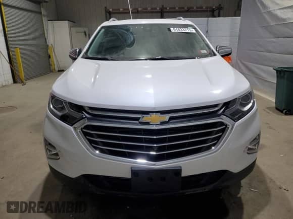 2021 Chevrolet Equinox Premier с VIN 3GNAXXEV2MS101608, выставлен на аукционе Copart как лот 64833715 с пробегом 40 566 миль миль и Списание • Salvage title. История ставок и продаж доступна на DreamBid. Изображение 5.