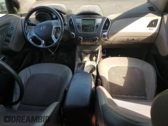 2012 Hyundai Tucson GLS with VIN KM8JU3AC7CU326017, listed as a Copart auction lot 71749405 with 279,791 mi miles and Salvage title. Bid and sale history available at DreamBid. Image 8.