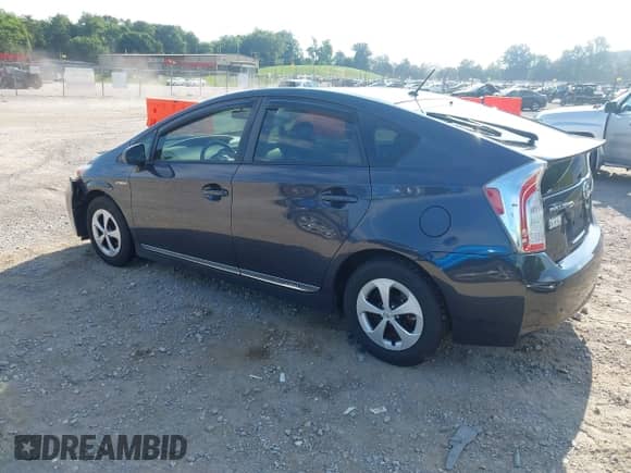 2013 Toyota Prius One with VIN JTDKN3DU3D1616798, listed as a IAAI auction lot 42763694 with 106,253 mi miles and . Bid and sale history available at DreamBid. Image 3.