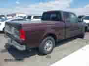 2000 Ford F-150 XL with VIN 1FTRX17L4YKA12726, listed as a IAAI auction lot 43199156 with Not provided miles and . Bid and sale history available at DreamBid. Image 4.