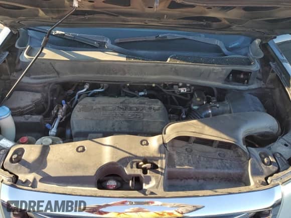 2015 Honda Pilot Touring z VIN 5FNYF3H94FB011132, wystawiony jako Copart lot #82784285 z przebiegiem 166 329 mil mil oraz Szkoda całkowita • Salvage title. Historia ofert i sprzedaży dostępna na DreamBid. Obrazek 11.