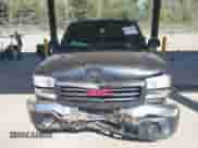 2005 GMC Sierra 1500 Work Truck z VIN 1GTEC14X75Z329663, wystawiony jako IAAI lot #42872806 z przebiegiem 182 385 mil mil oraz . Historia ofert i sprzedaży dostępna na DreamBid. Obrazek 13.