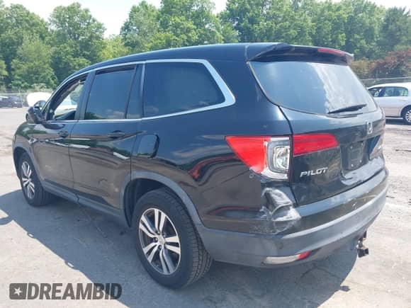 2016 Honda Pilot EX-L with VIN 5FNYF6H65GB023069, listed as a IAAI auction lot 42791699 with 154,991 mi miles and . Bid and sale history available at DreamBid. Image 3.