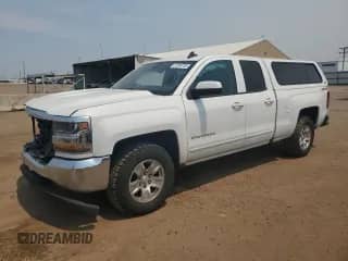 2018 Chevrolet Silverado 1500 LT with VIN 1GCVKREH3JZ307646, listed as a Copart auction lot 67209755 with 197,485 mi miles and Salvage title. Bid and sale history available at DreamBid. Image 1.