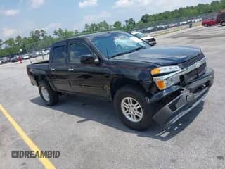 2011 Chevrolet Colorado 1LT z VIN 1GCHTCFE8B8105355, wystawiony jako IAAI lot #42298157 z przebiegiem 213 853 mil mil oraz . Historia ofert i sprzedaży dostępna na DreamBid. Obrazek 1.