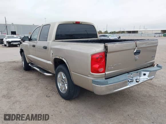 2005 Dodge Dakota SLT with VIN 1D7HE48N45S337753, listed as a IAAI auction lot 41084928 with 177,018 mi miles and . Bid and sale history available at DreamBid. Image 3.