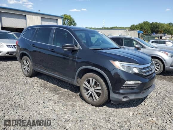2017 Honda Pilot EX with VIN 5FNYF6H39HB013569, listed as a Copart auction lot 71841185 with 200,737 mi miles and Clean title. Bid and sale history available at DreamBid. Image 4.