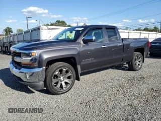 2016 Chevrolet Silverado 1500 LT с VIN 1GCVKREC0GZ319282, выставлен на аукционе Copart как лот 81421215 с пробегом 71 505 миль миль и Списание • Salvage title. История ставок и продаж доступна на DreamBid. Изображение 1.